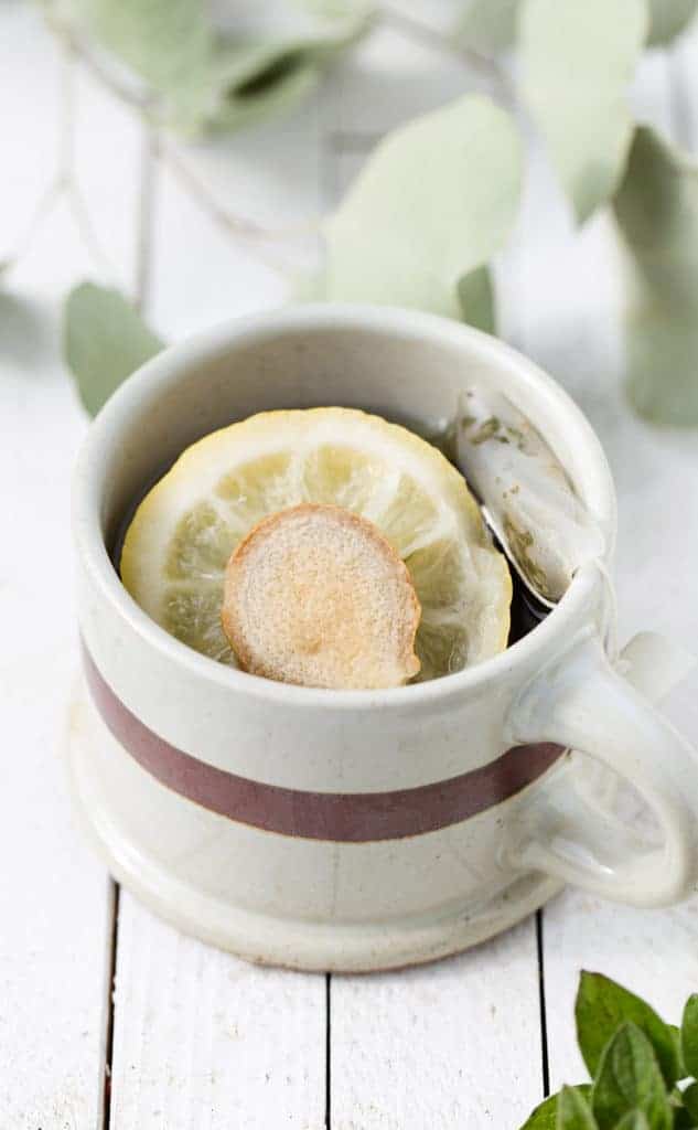 A hot mug of ginger lemon green tea
