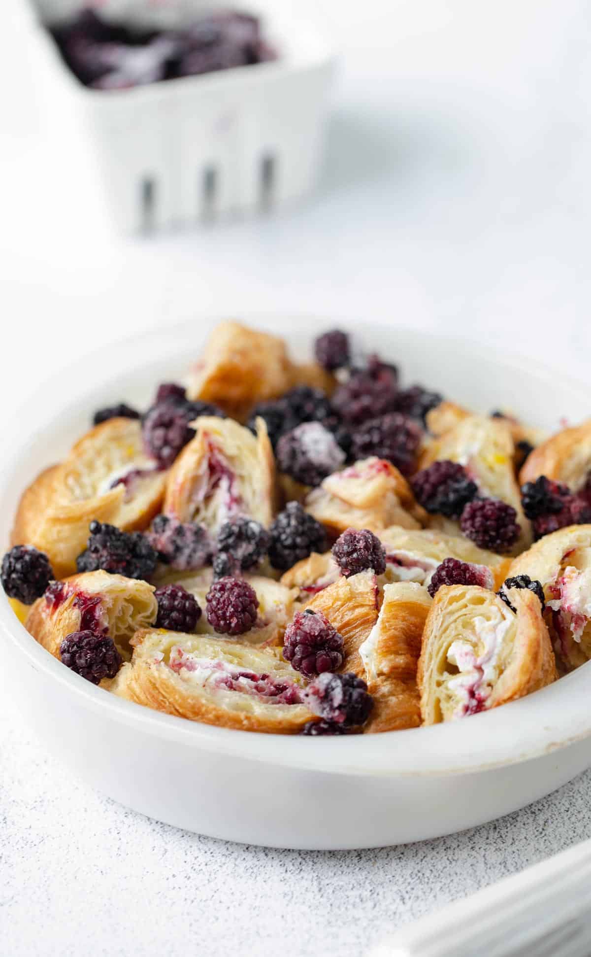 Blackberries and Cream Croissant French Toast Bake is an easy make ahead breakfast recipe with crispy croissants and the sweet flavors of berries and cream.  overnight French toast casserole recipe | Blackberry recipes | Brunch recipes | easy cream cheese stuffed French toast | make ahead breakfast 